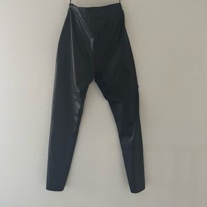Aytin pleated wide leg trouser. Black leather pants, no pockets.